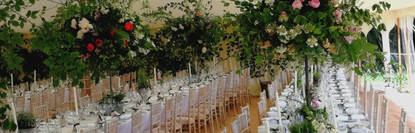 100' x 40' Limewashed chairs and fabulous flowers