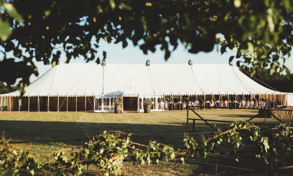 120' x 40' traditional canvas marquee in hot july 2019